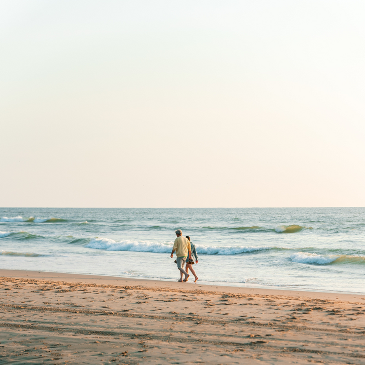 Couple walking on beach